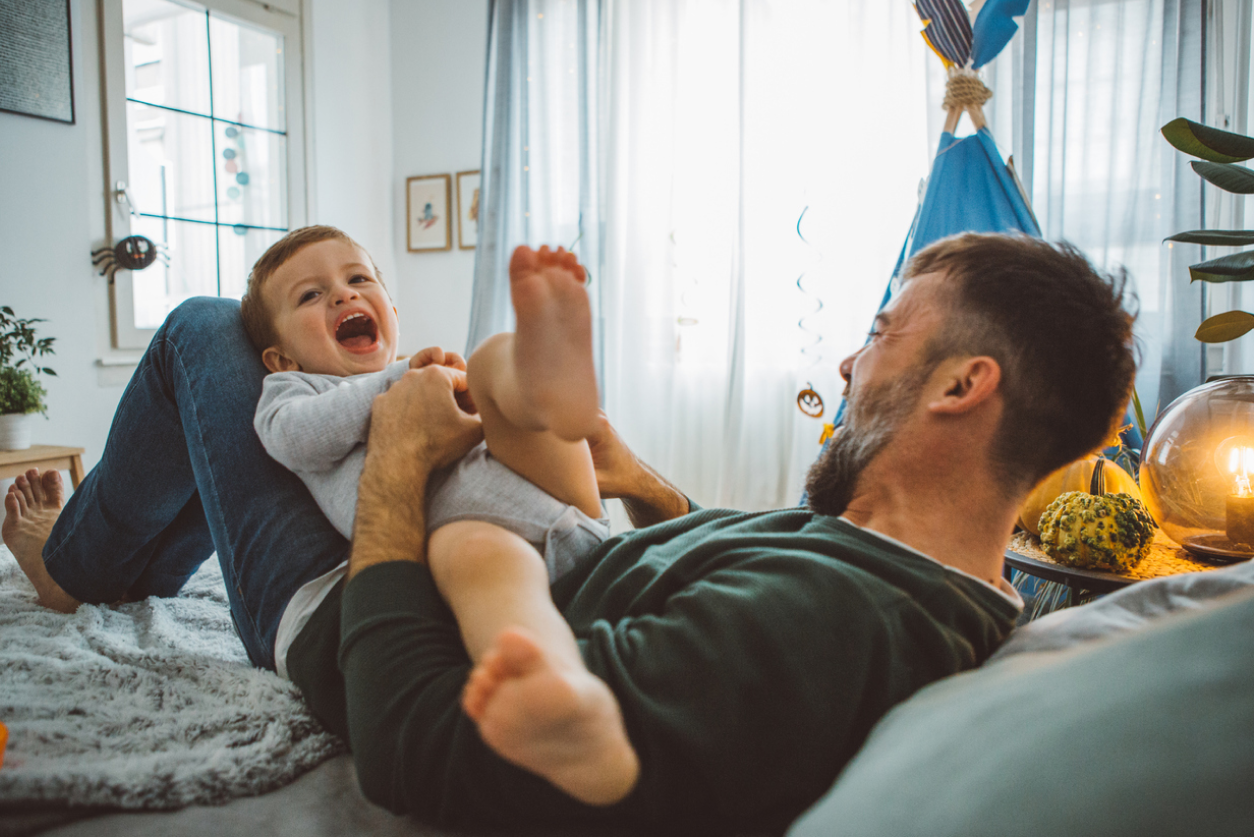 parent and child laughing, gift for new parent